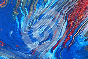 Photography of abstract marbleized effect background. Blue, red and white creative colors. Beautiful paint