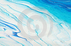Photography of abstract marbleized effect background. blue and white creative colors. Beautiful paint