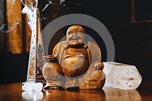Crystals and buddhist meditation and buddha Hotei photo