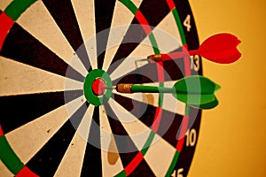 Photography of darts with dartboard