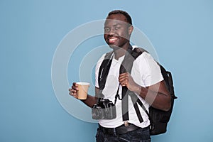 Photography enthusiast going on urban citybreak while having voyage traveler bag and DSLR camera. photo