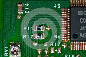 Photography of green electronic board with components