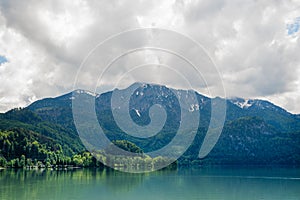 Photography of a lake with big mountain at horizon