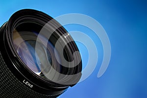 Photography lens over blue