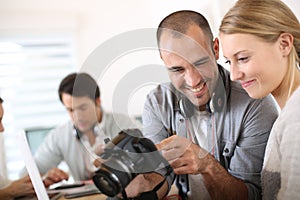 Photography students checking the photos photo