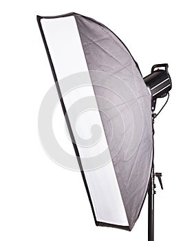 Photography studio flash with softbox isolated on white background with lamp.