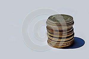 Photography of tower of coins, random old world coins
