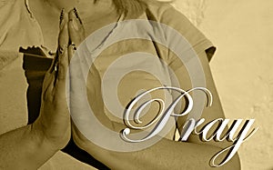 Photography of woman making praying gesture with her hands with word Pray