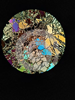 Photomicrograph of dunite mineral.