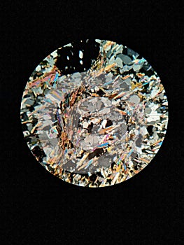 Photomicrograph of staurolite garnet chlorite mica schist rock cross polar light.