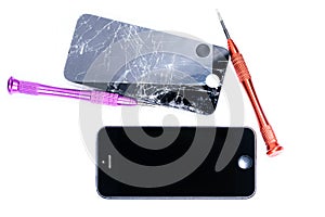 Photos showing the process of repairing a broken mobile phone with a screwdriver in the laboratory for repair of mobile equipment