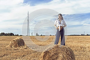 Photoshoot of a girl in a wheat field
