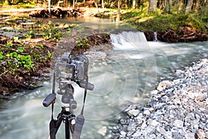 Photoshooting with camera on tripod