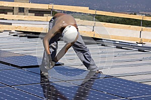 Photovoltaic panels laborer