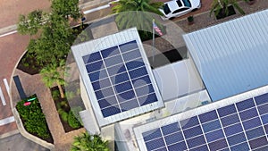 Photovoltaic panels for producing clean electric energy. Florida office building with solar roof. Renewable electricity