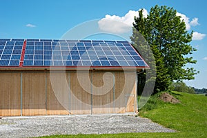 Photovoltaic panels on roof of barn photo