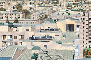 Photovoltaic panels on the roof of a residential building