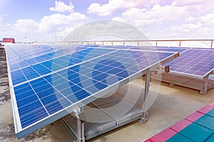 Photovoltaic panels of solar power station in the landscape with heat of sun. View from above