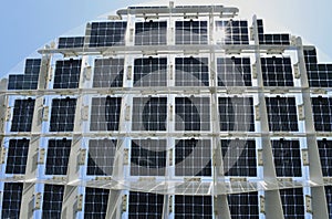 Photovoltaic solar cells on top of elegant steel structure.