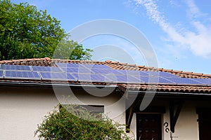 Photovoltaic solar modern panel on the roof of a house