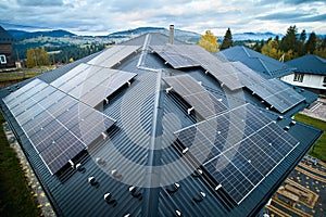 Photovoltaic solar panel system on the roof of house.