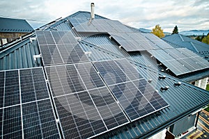 Photovoltaic solar panel system on the roof of house.