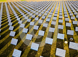 Photovoltaic solar panels at field, aerial photo