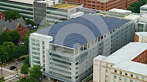 Photovoltaic solar panels over parking garage for generation of renewable energy. Sustainable power production
