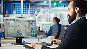 Technician optimizing energy supply in solar panel manufacturing plant