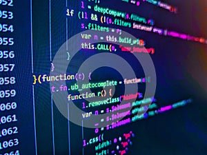 Php language and coding function developer. HTML5 concept macro backdrop in warm colors. Screen of web developing php code on dark