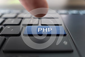 PHP logo on pc keyboard. Writing code PHP programming. Creating web projects in Hypertext Preprocessor language. Website