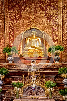 The Phra Buddha Sihing statue in the Viharn Lai Kham at Wat Phra Singh , Chiang Mai , Thailand