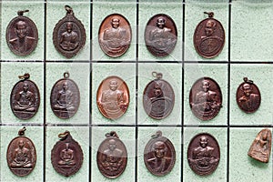 Phra Khuva Boonchum coins , Small Buddha image or Thai amulet