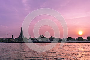 Phra Prang Wat Arun, The beautiful temple along the Chao Phraya river at sunset in Bangkok, Thailand