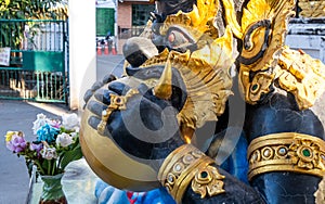 Phra Rahu or celestial monster statute which causes eclipsesby eating the moon in Thai`s style for blessing in luck and success