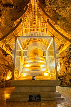 Phra Sabai cave with golden pagoda in Lampang province