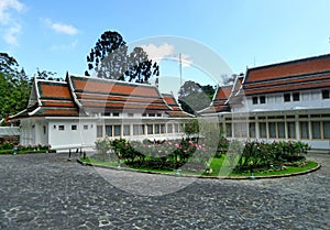 Phra Tamnak Phuping Rajanives, the main building of the Winter Palace , in the flower garden