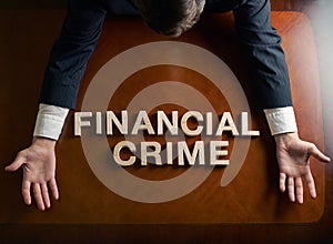 Phrase Financial Crime and devastated man