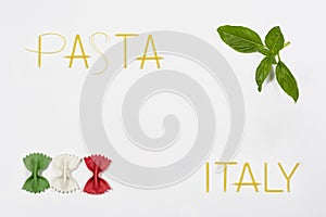 Phrase I LOVE PASTA made of raw spaghetti on white background