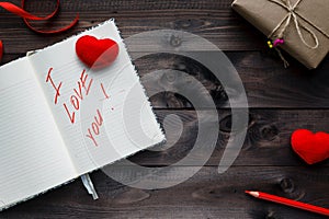 Phrase about love written in notebook