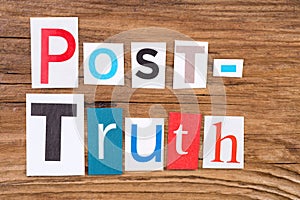 Phrase `Post-Truth` in cut out magazine letters