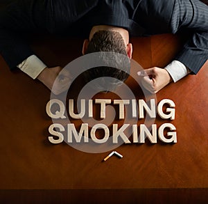 Phrase Quitting Smoking and devastated man