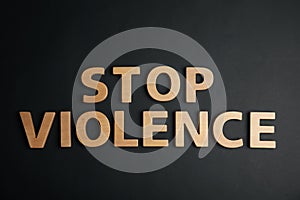 Phrase STOP VIOLENCE on black background