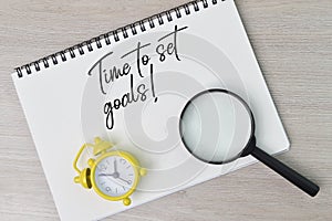 Phrase TIME TO SET GOALS written on notebook. Conceptual image