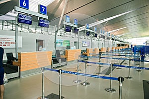 PHU QUOC, VIETNAM JUNE 28, 2017: The public check-in area of an airport with crowd control barriers