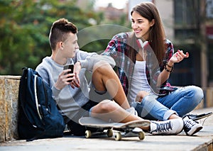 Phubbing: teenager ignore his friend photo