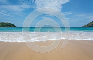 PHUKET, THAILAND- JUL 25, 2017: Crowds of tourists at Naihan beach on JUL 25, 2017 in Phuket, Thailand. Phuket is a popular destin