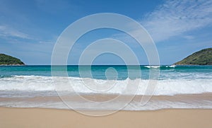 PHUKET, THAILAND- JUL 25, 2017: Crowds of tourists at Naihan beach on JUL 25, 2017 in Phuket, Thailand. Phuket is a popular destin