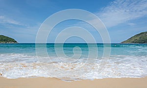 PHUKET, THAILAND- JUL 25, 2017: Crowds of tourists at Naihan beach on JUL 25, 2017 in Phuket, Thailand. Phuket is a popular destin