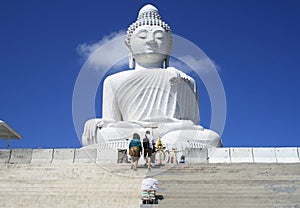 Phuket, Thailand, Karon Beach - 02. 12. 2019. Tourists climb to the White statue of the Big Buddha